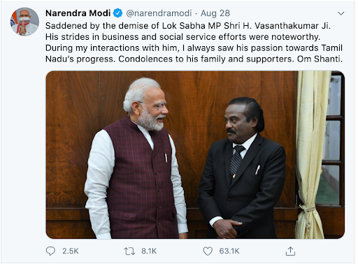 PM Narendra Modi interacting with Shri H Vasanthakumar